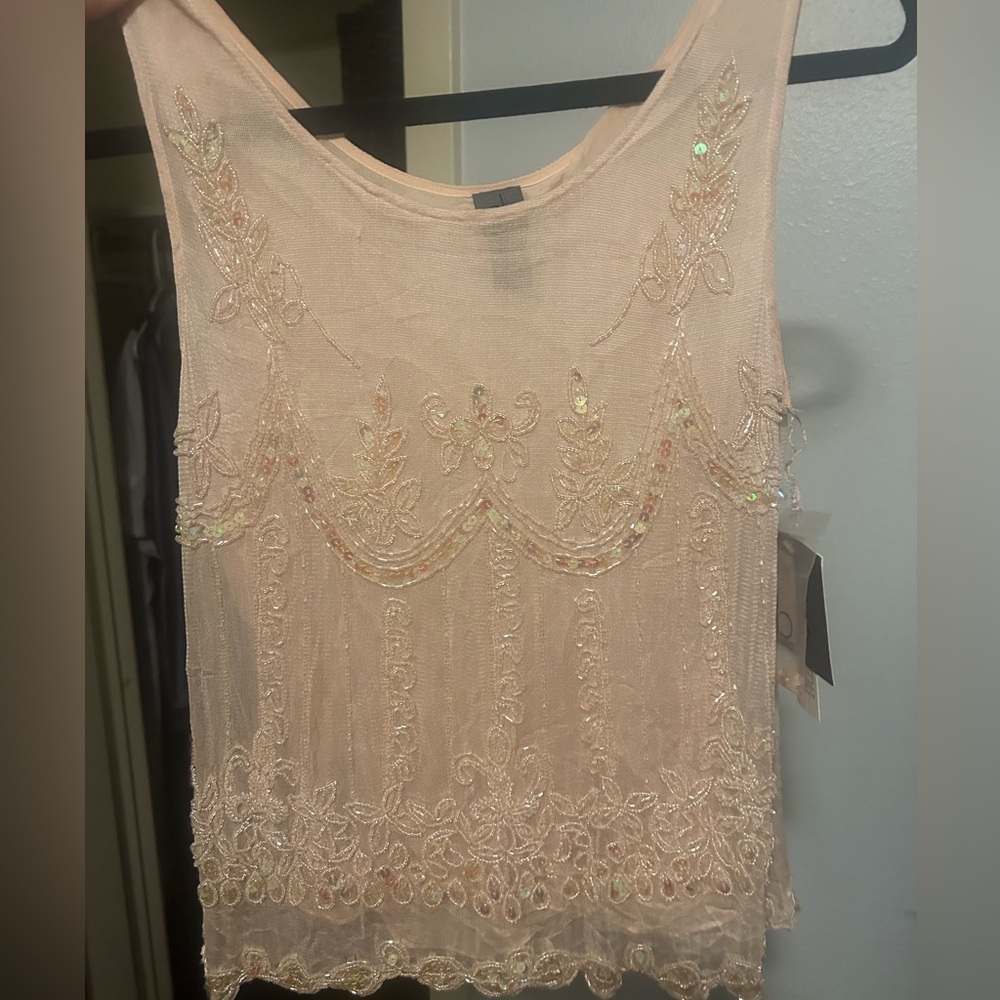 - Calvin Klein from Saks size 4 blush beaded tank